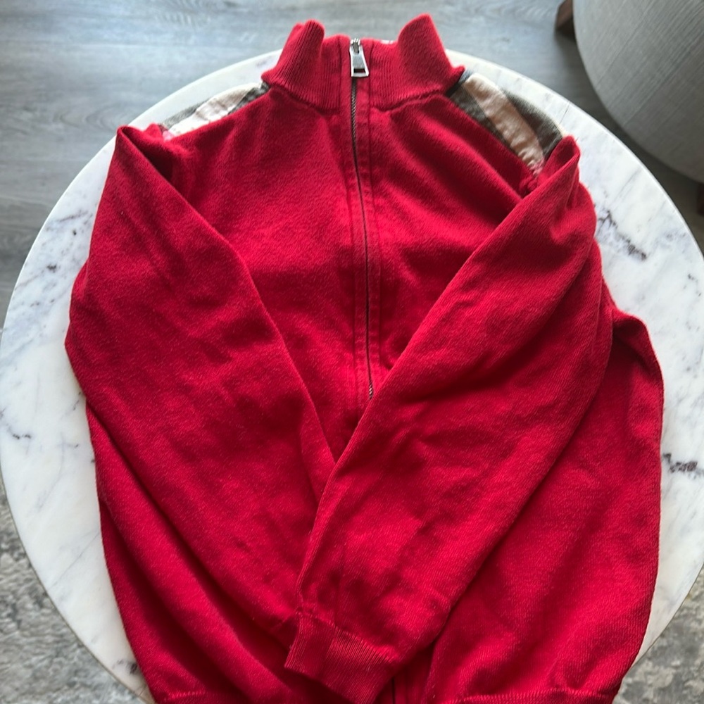 Red children’s Authentic Burberry sweater. Gently used. 6Y